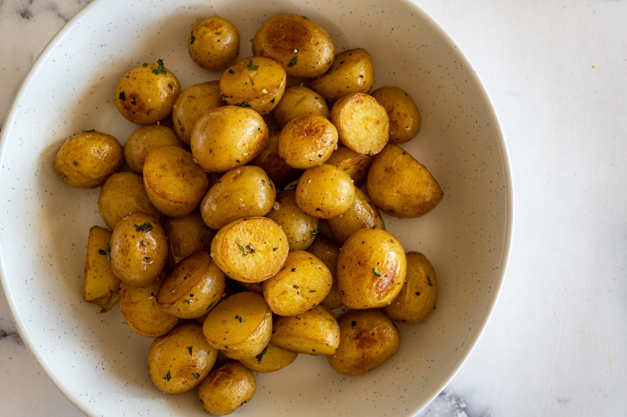Finished and garnished sous vide potatoes ready for the dinner table.