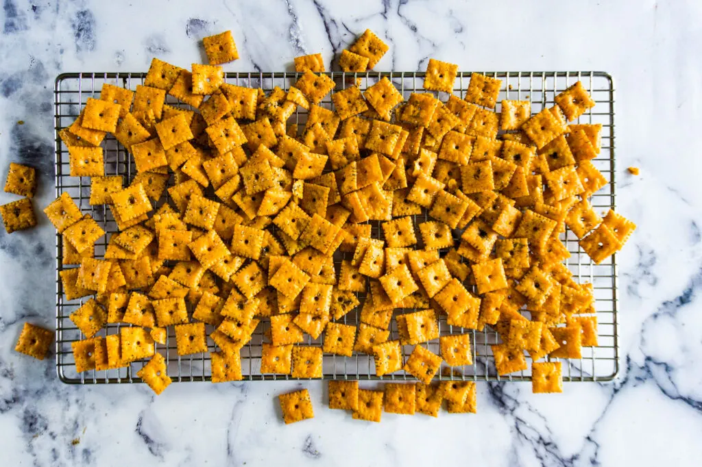 Crackers spread on a cooling rack.