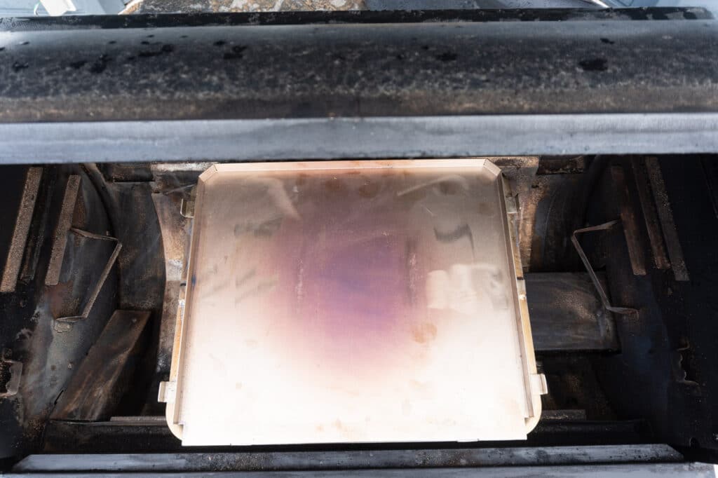 Overhead view of the modified pizza oven inside the Traeger.