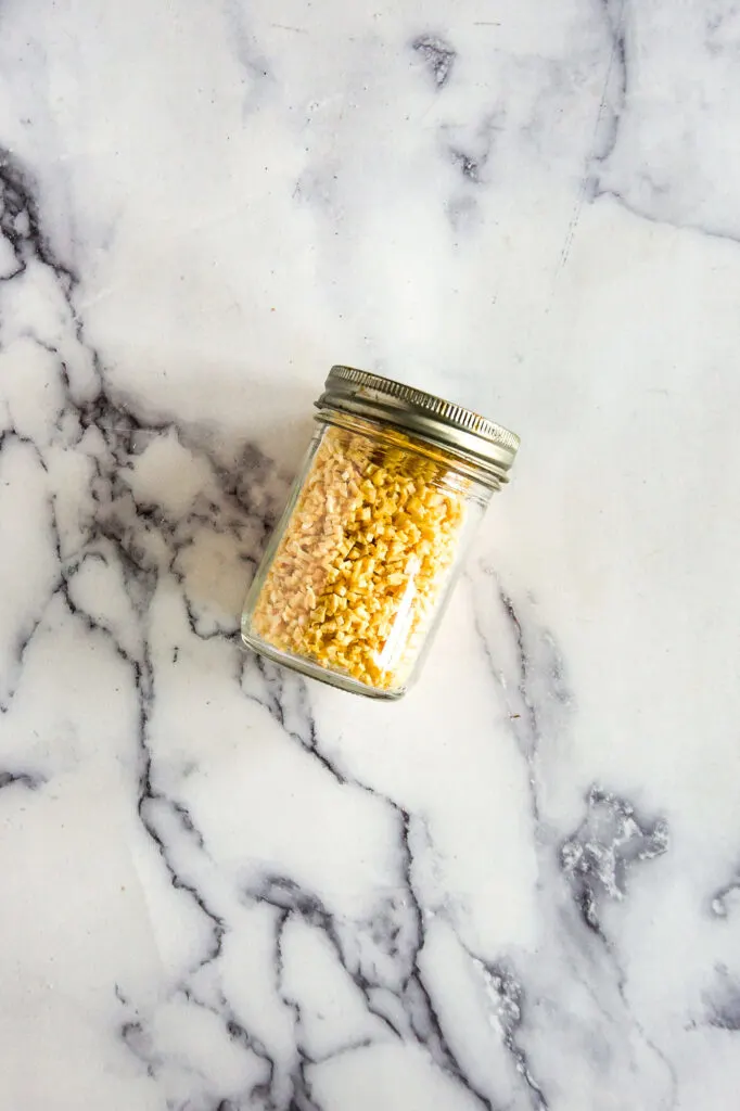 Dehydrated minced garlic in a mason jar.