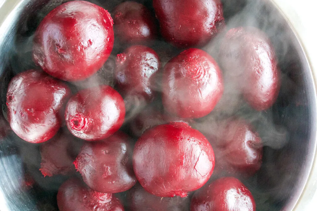 Steaming beets in a bowl