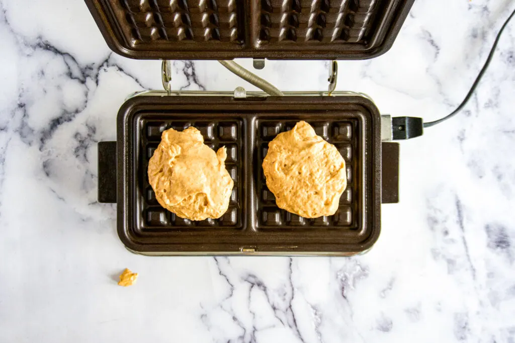 pumpkin waffles in vintage waffle iron.