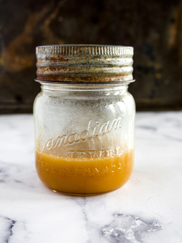 Mixed up apple cider vinaigrette in a jar.