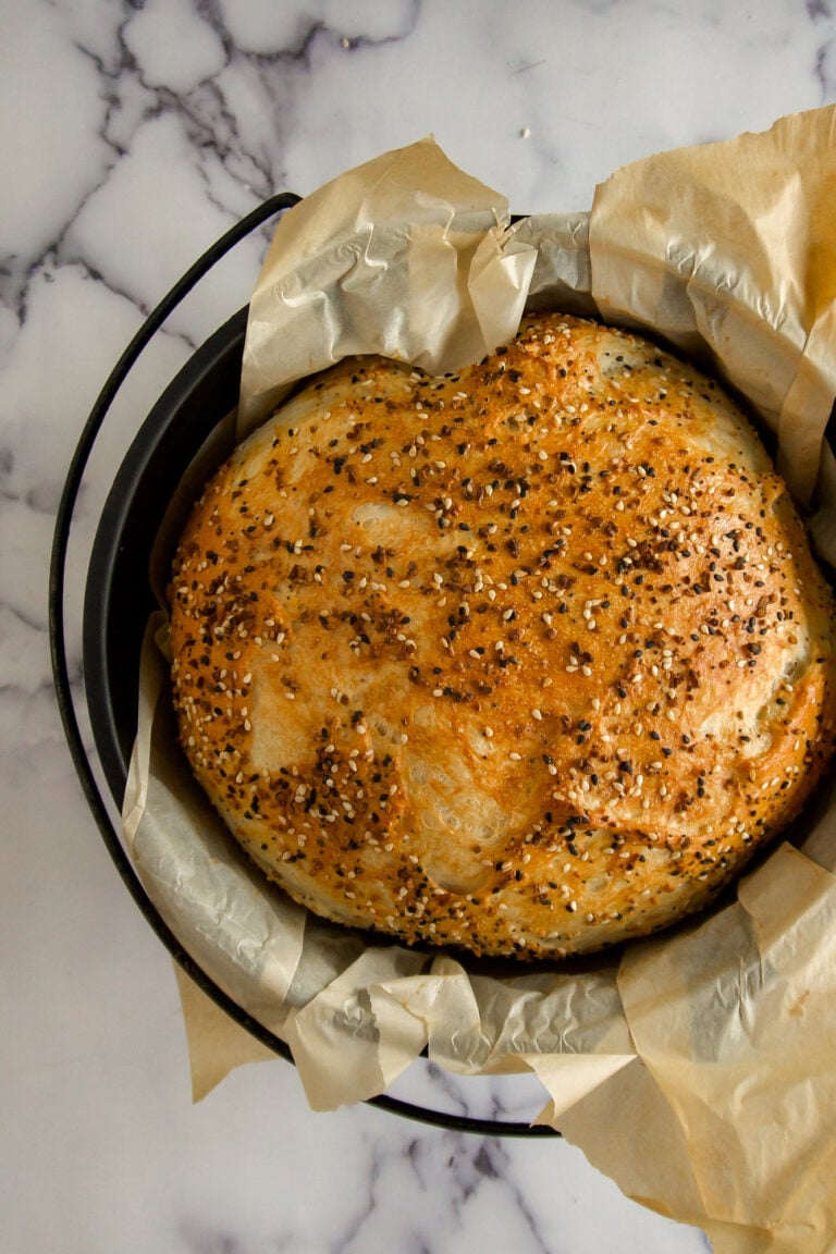 Everything Bagel Bread in a cast iron dutch oven.