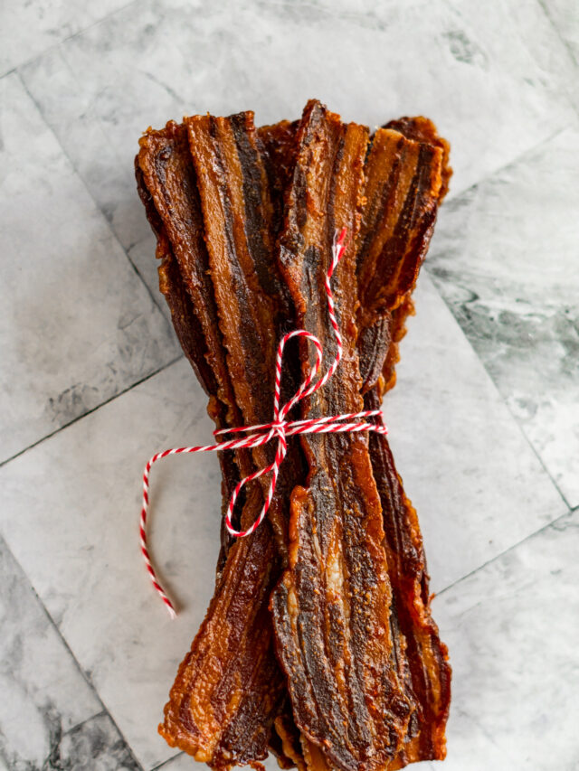 Bacon jerky wrapped in red and white twine.
