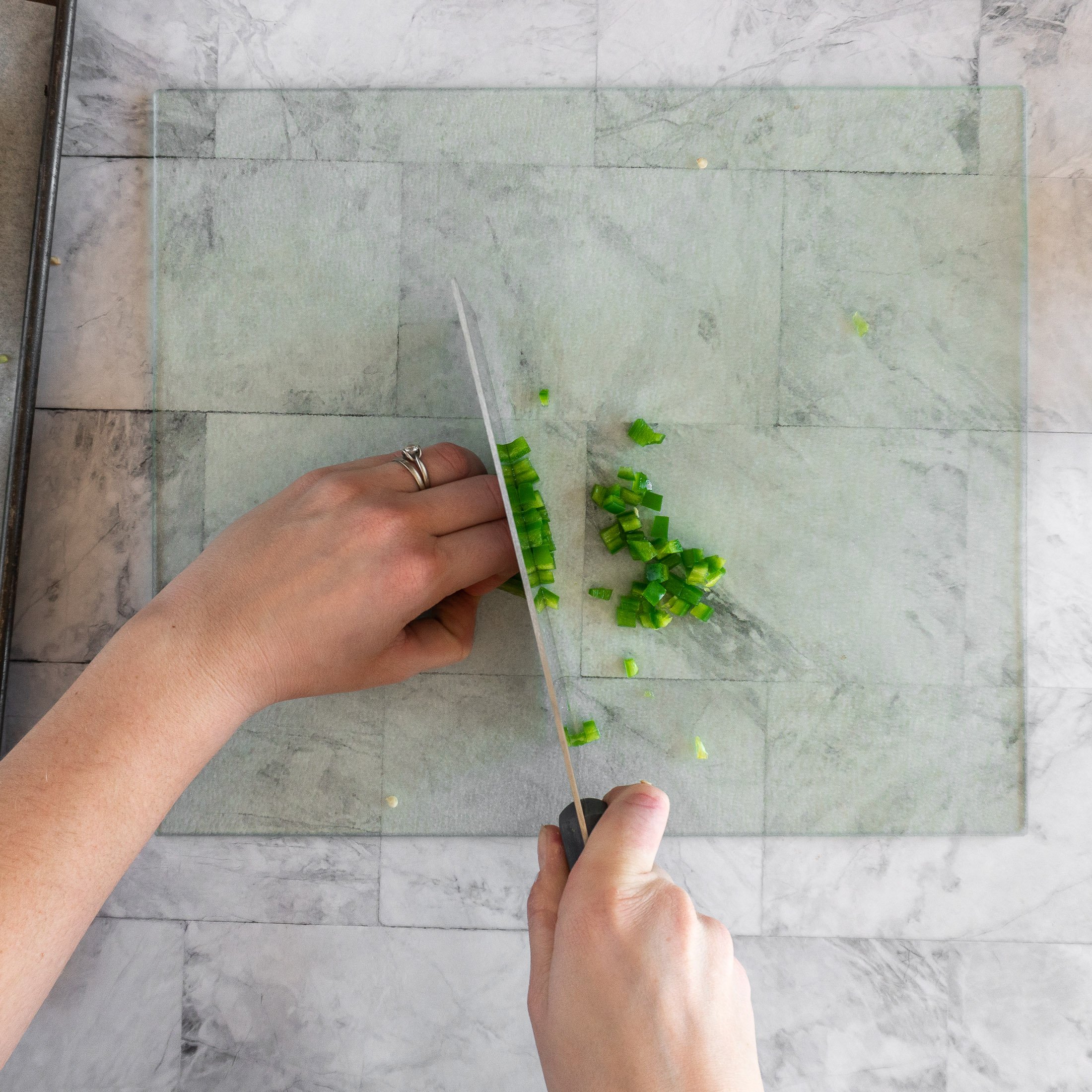 Dicing a jalapeno. 