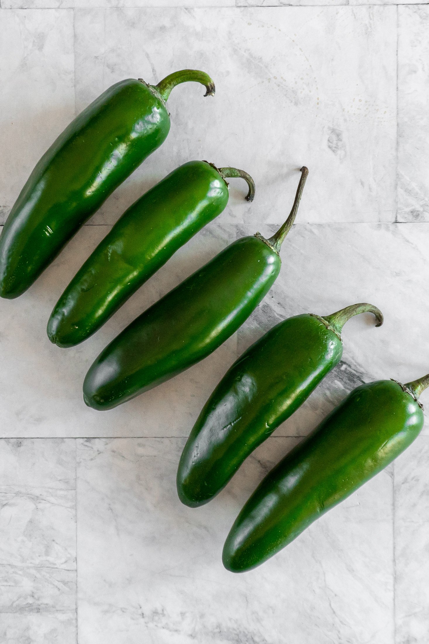 5 ripe jalapenos in a row. 
