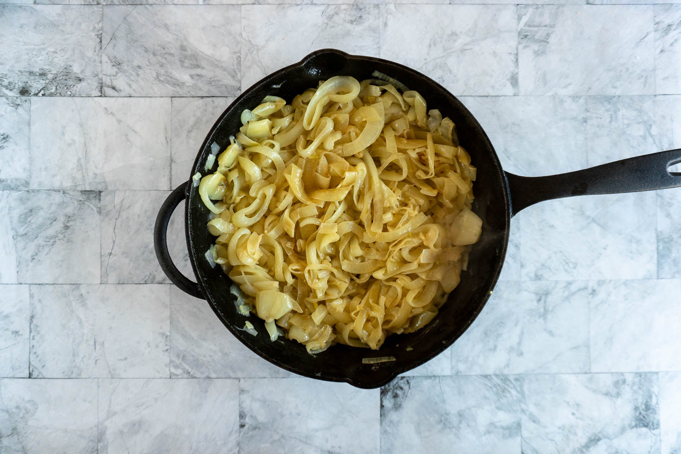 caramelizing onions in a cast iron skillet. 