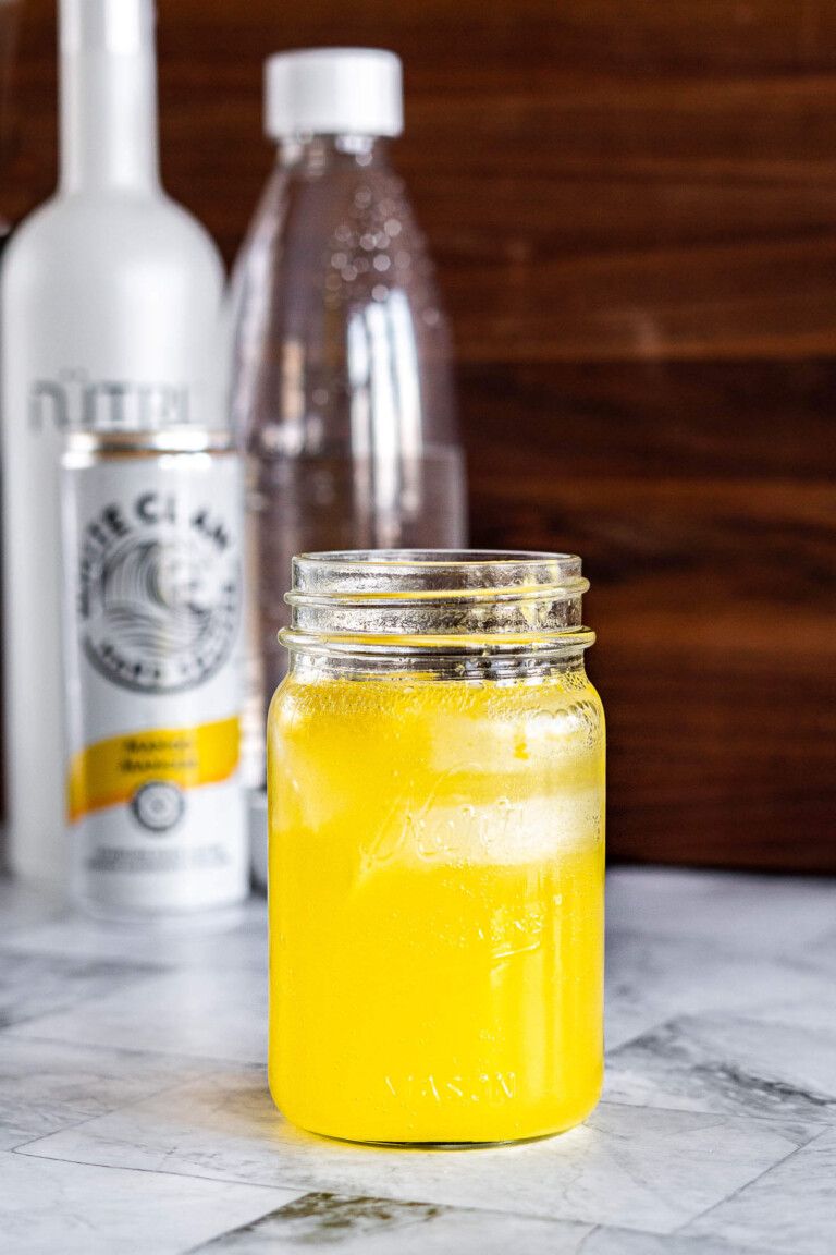Homemade hard seltzer in a mason jar.