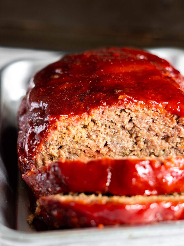 Smoked meatloaf on a small baking sheet.