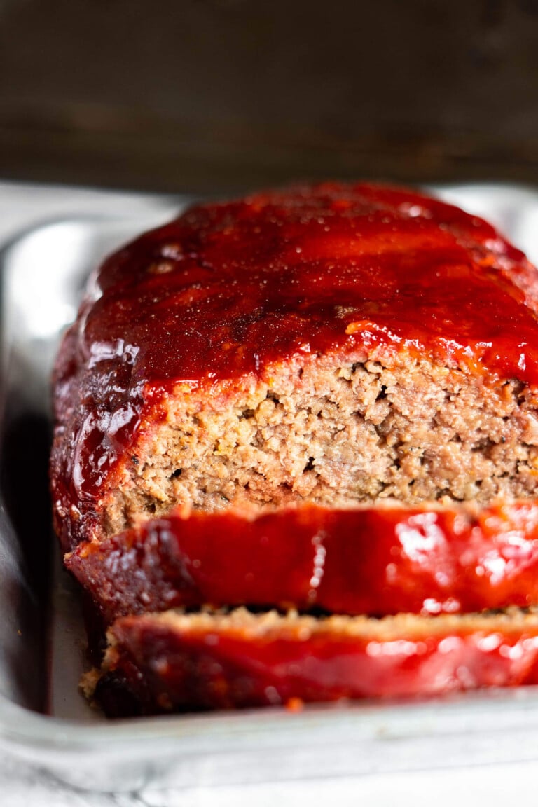 Smoked meatloaf on a small baking sheet.