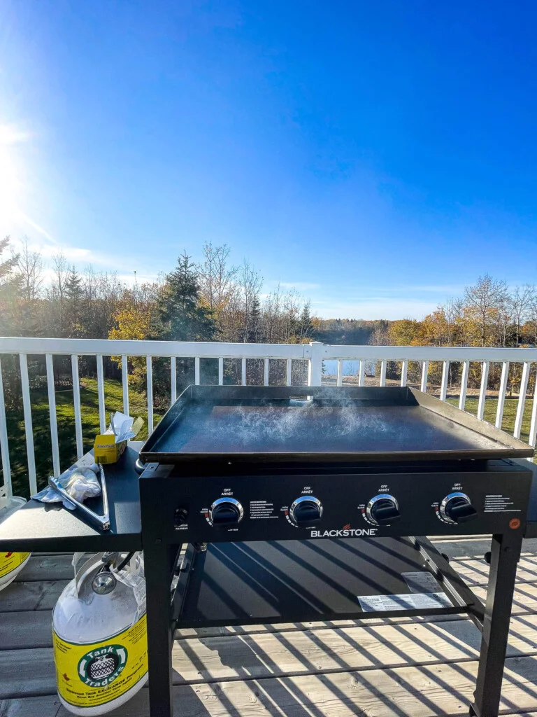 Seasoning a Blackstone flat top griddle.