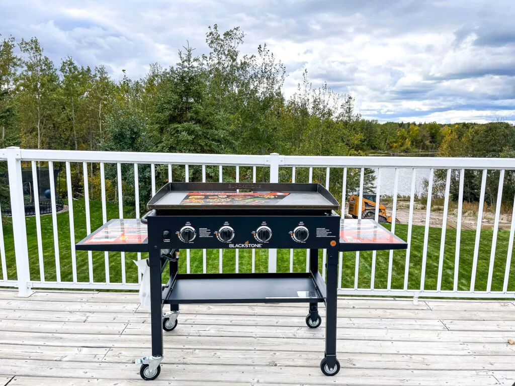 Brand new 36" blackstone griddle set up on a deck.