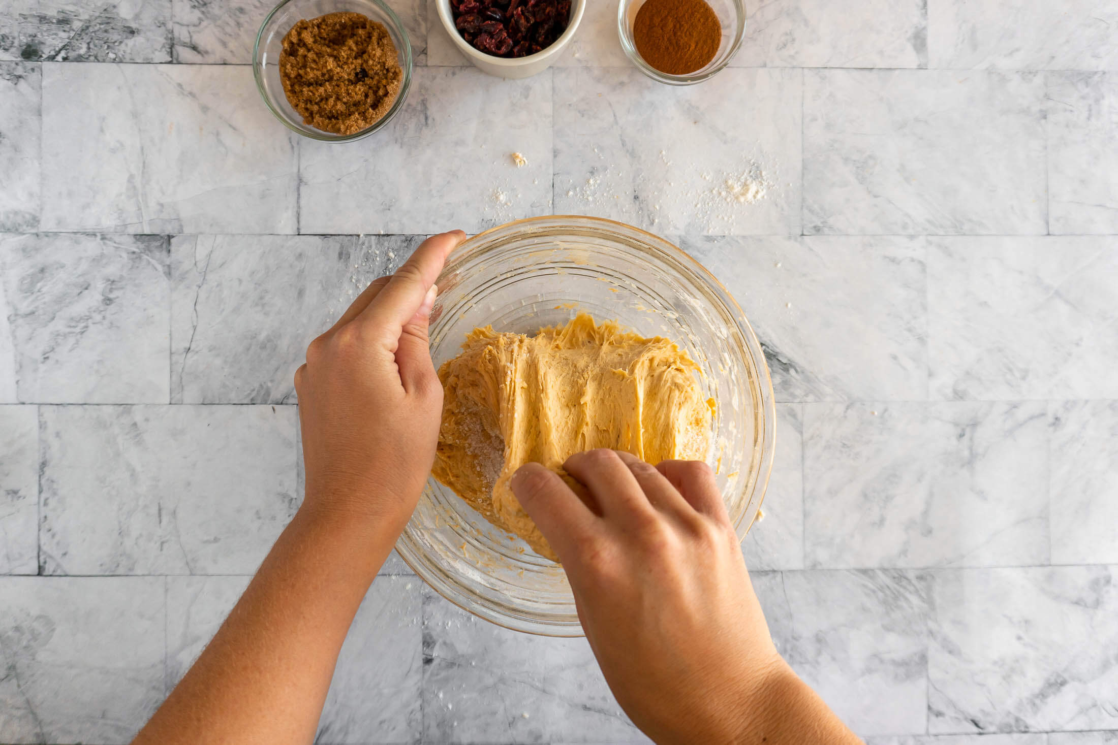 Folding dough during a stretch and fold.