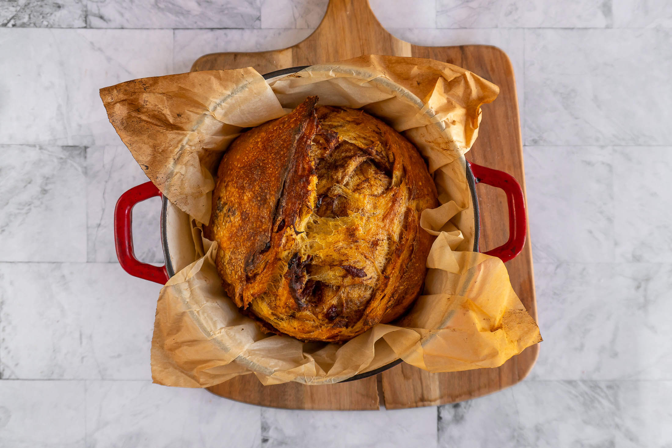 Baked pumpkin sourdough in a dutch oven.
