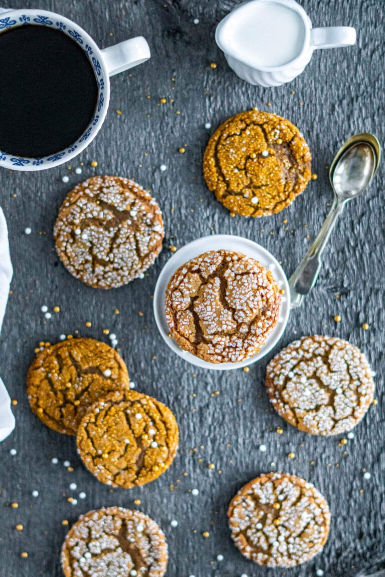 Baked ginger snaps on a wooden board.