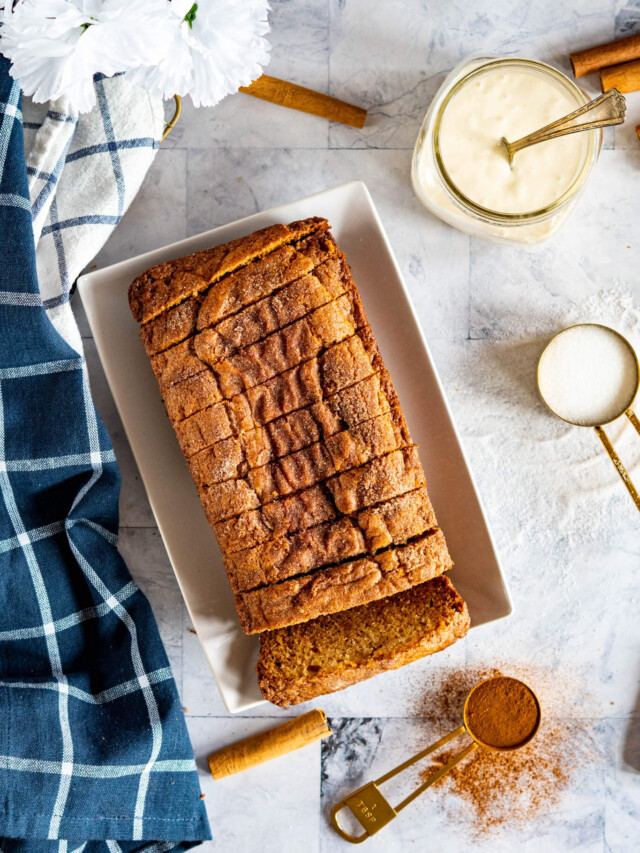 Sliced Amish cinnamon bread on a white plate.