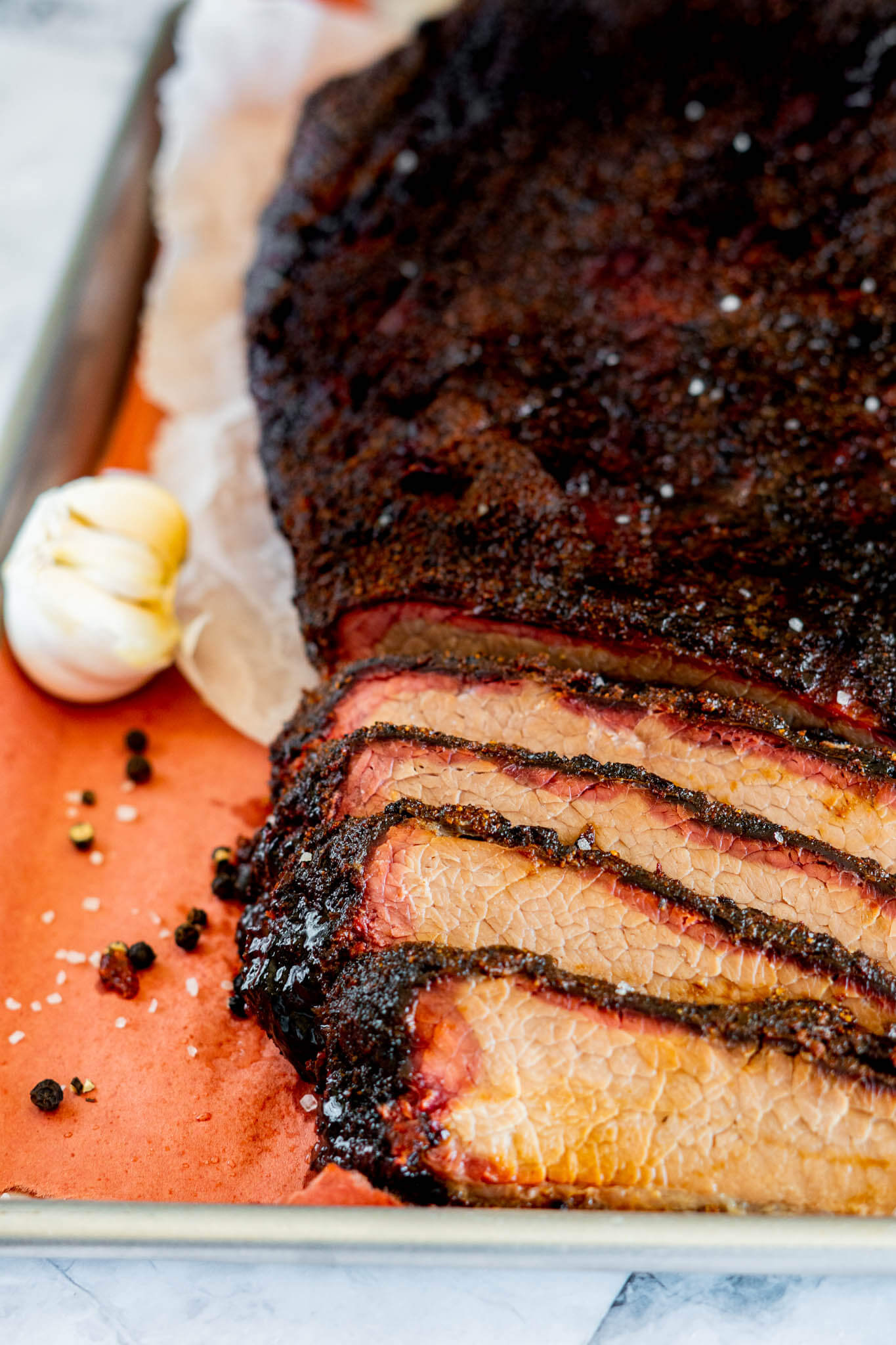 Sliced brisket showing off a smoke ring.