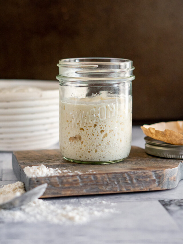 Opened mason jar with sourdough starter.
