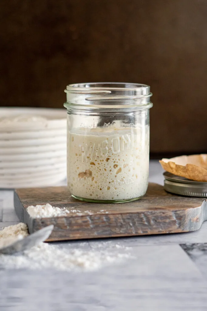 Opened mason jar with sourdough starter.
