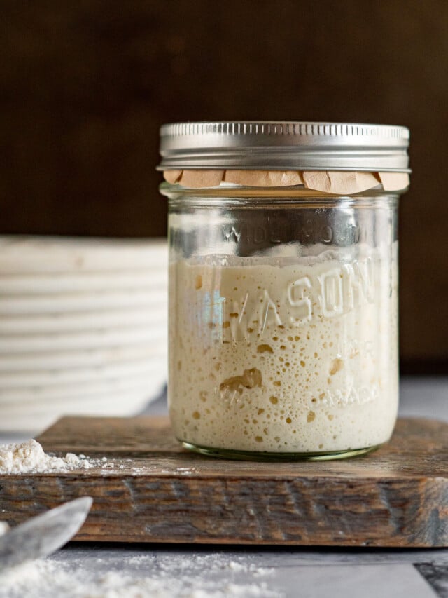 Ripe sourdough starter in a mason jar.