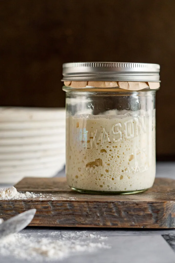 Ripe sourdough starter in a mason jar.