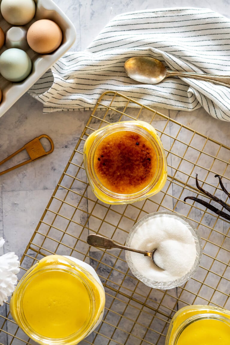 Overhead view of a trio of creme brulee.
