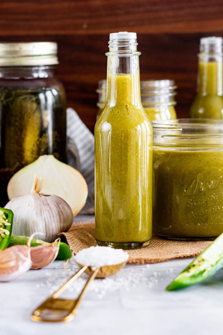 Dill pickle hot sauce in a woozy bottle.