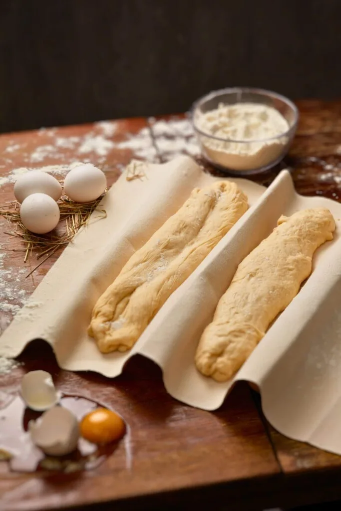 Baguettes in a linen couche.