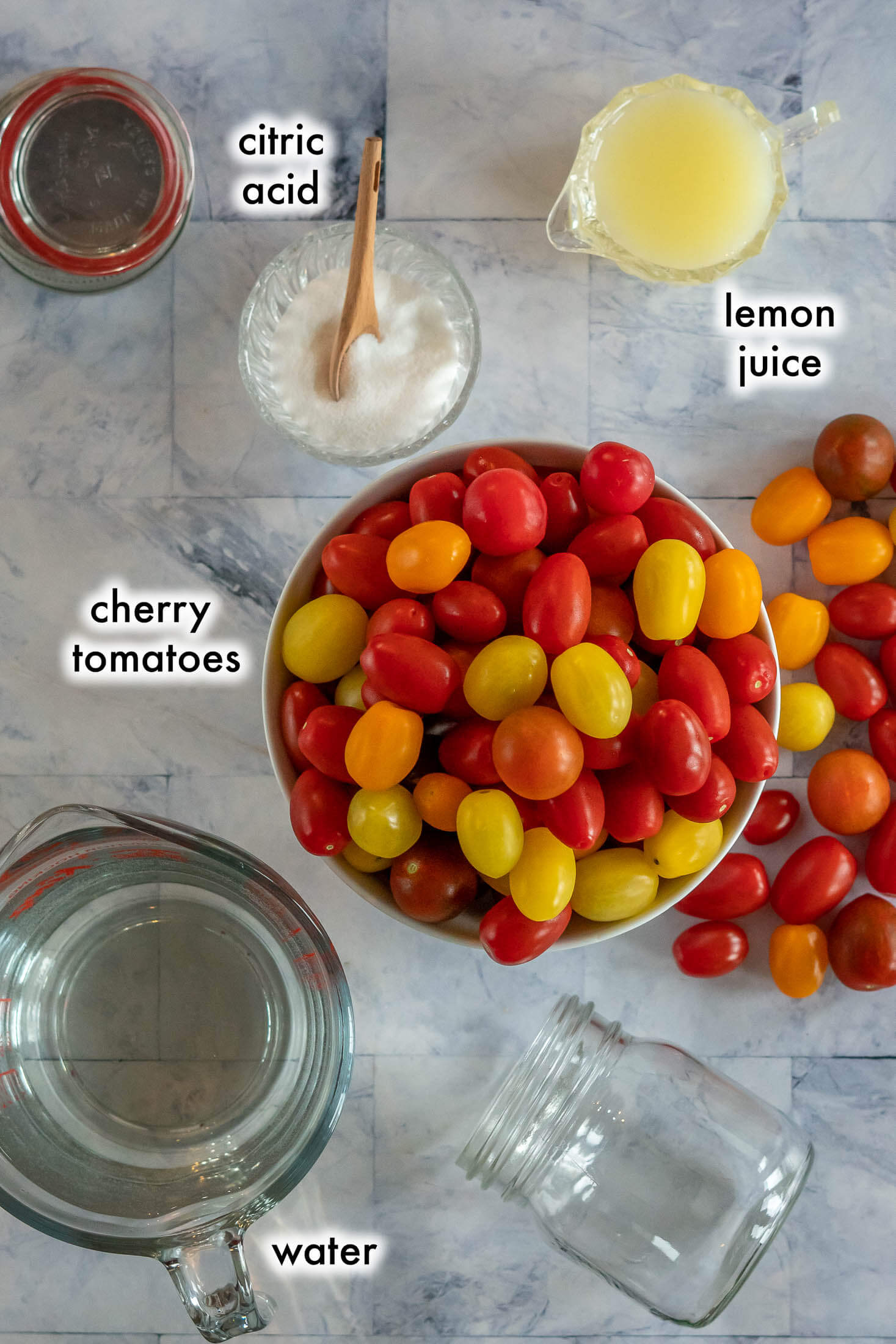 Ingredients required for canning cherry tomatoes.