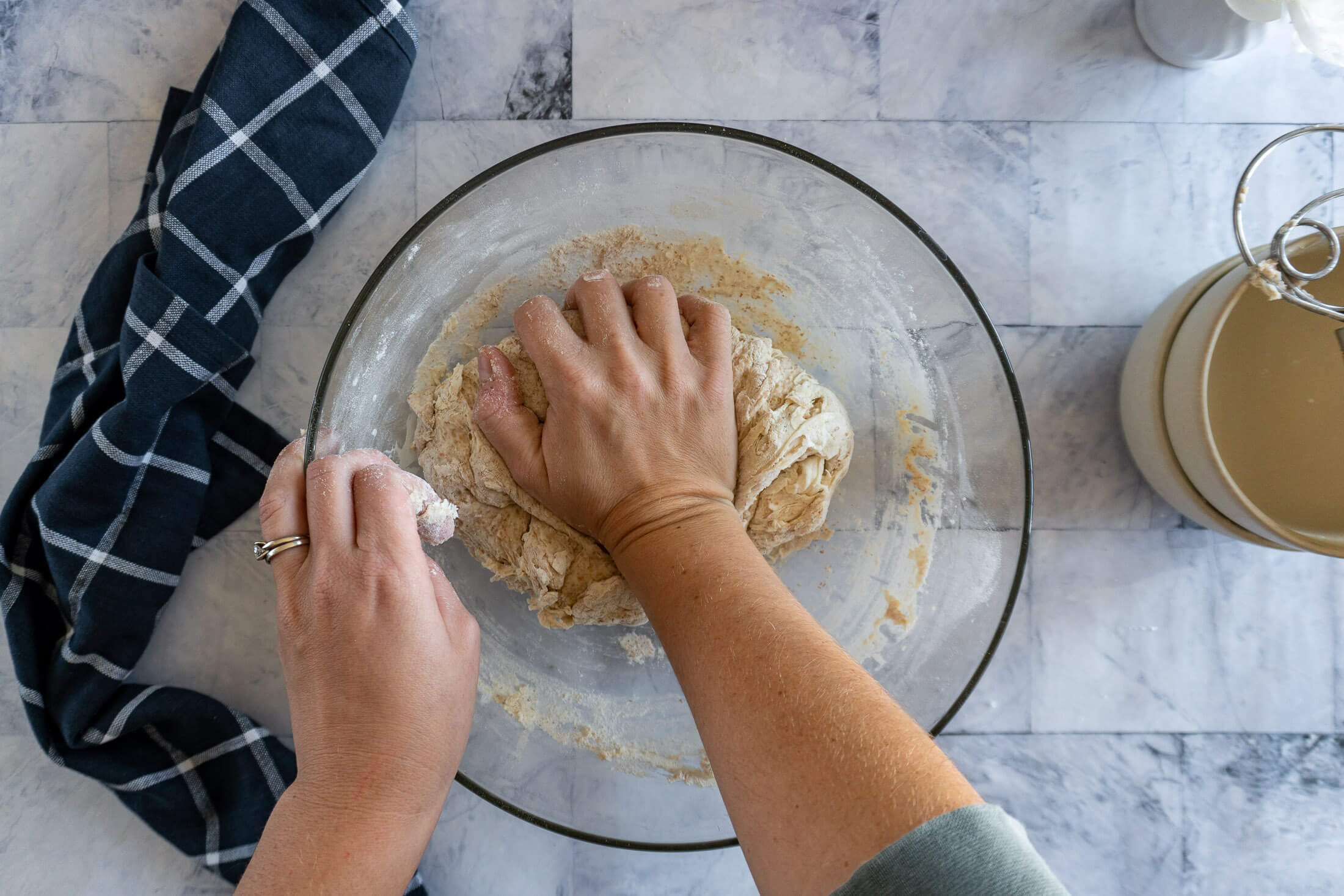 Kneading the shaggy dry bits into the dough.