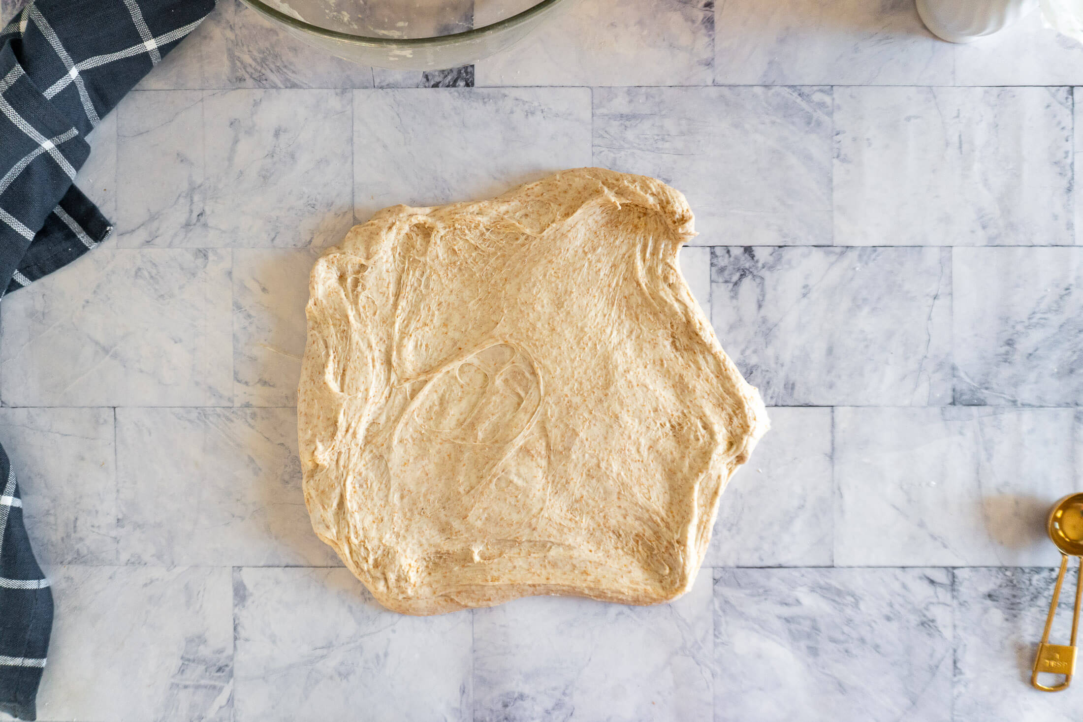 Spreading the dough.