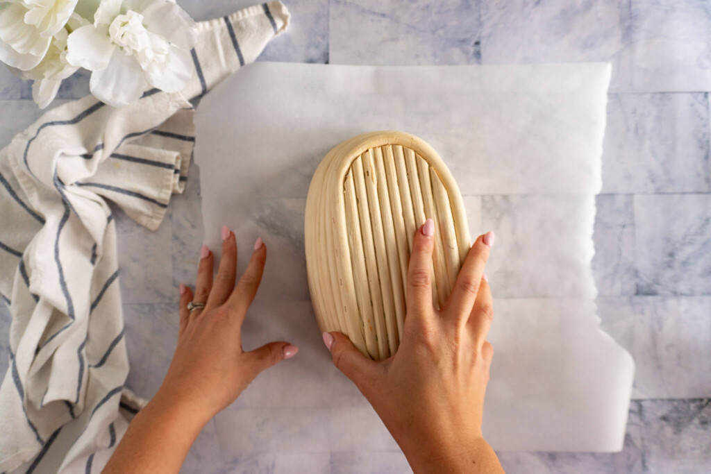 Turning dough out of banneton. 