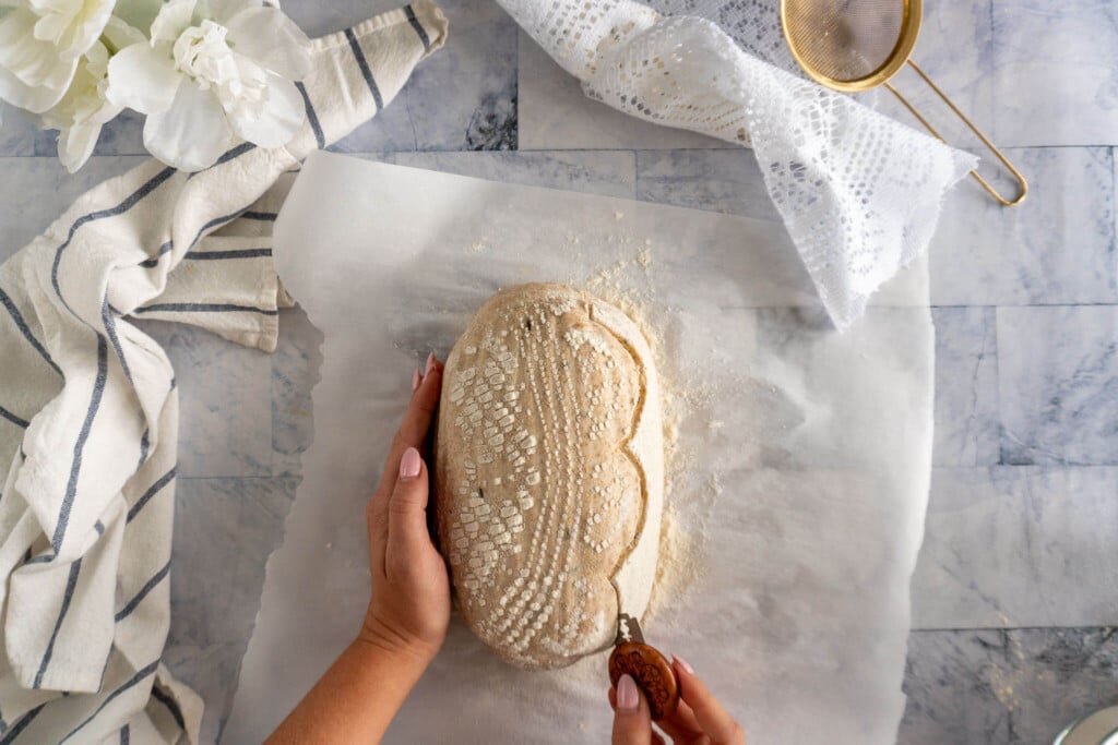 Decorative scoring along the doily pattern. 