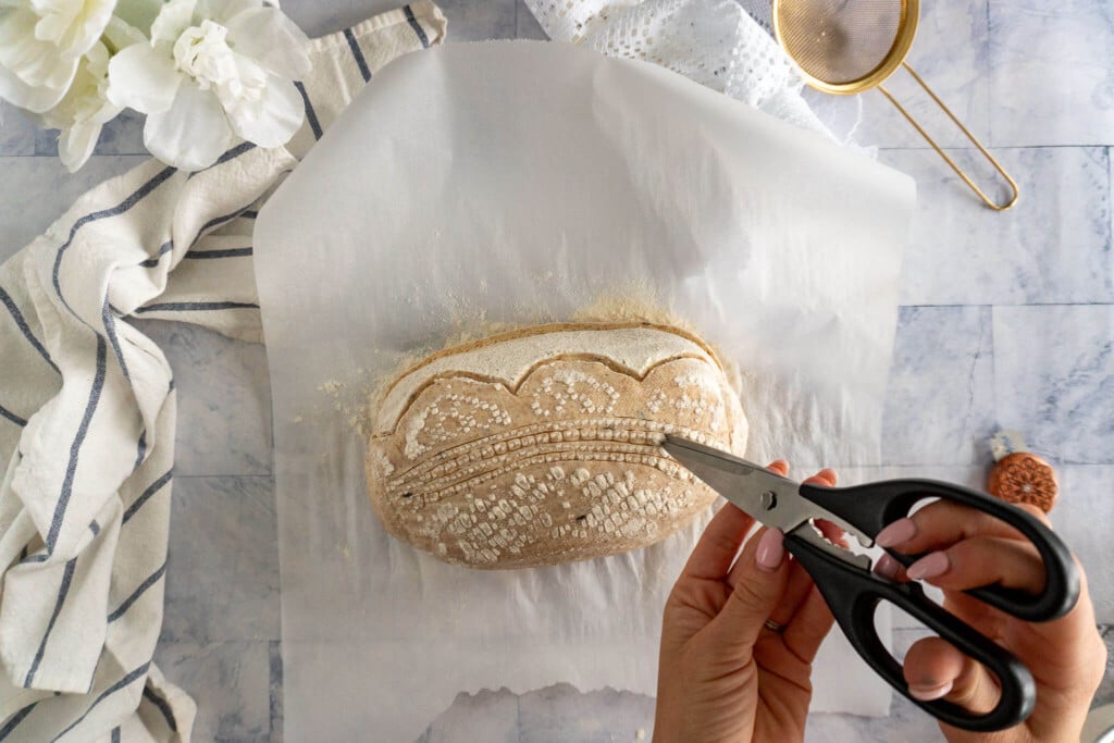 Using scissors to add snip marks. 