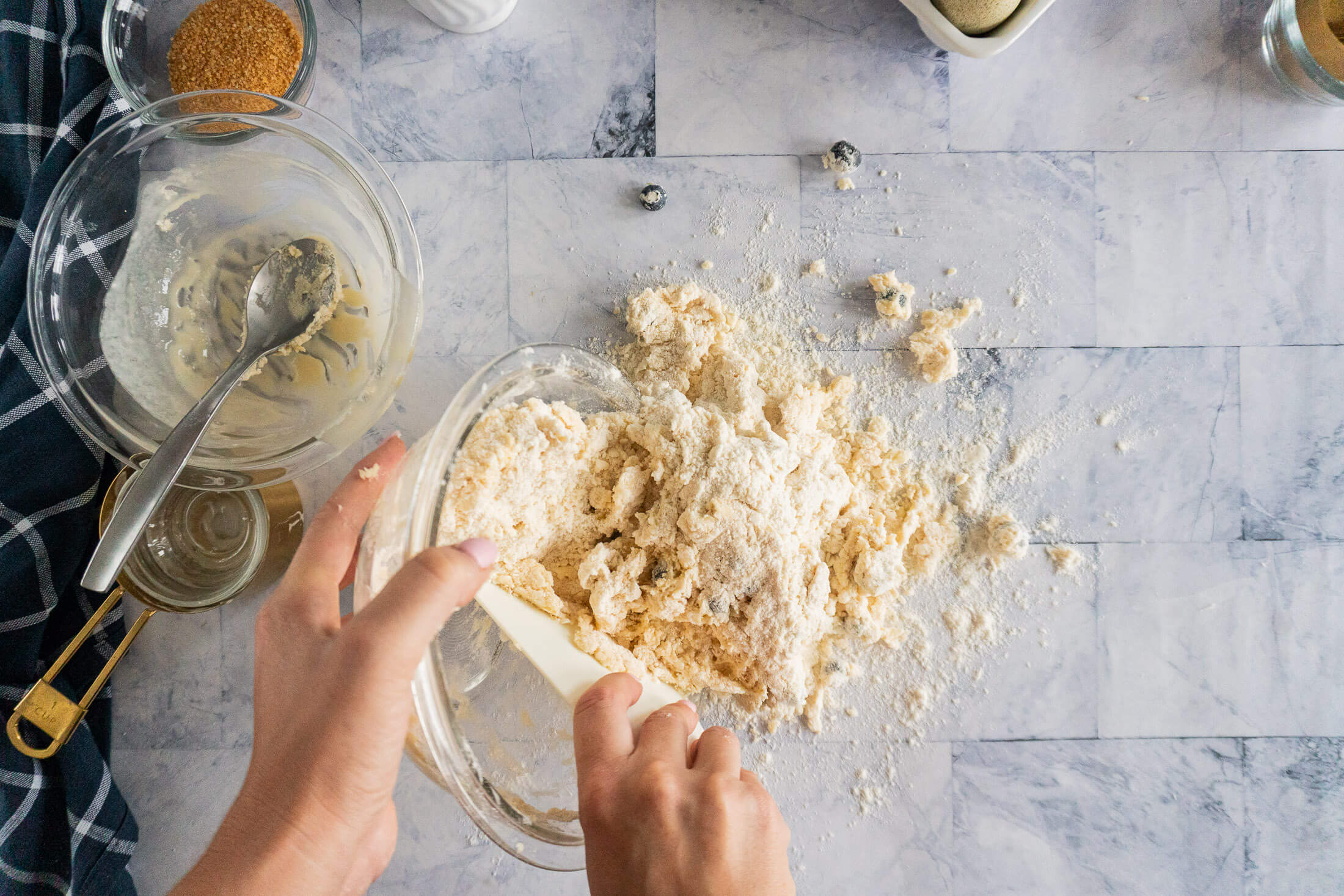 Pouring dough onto floured surface.