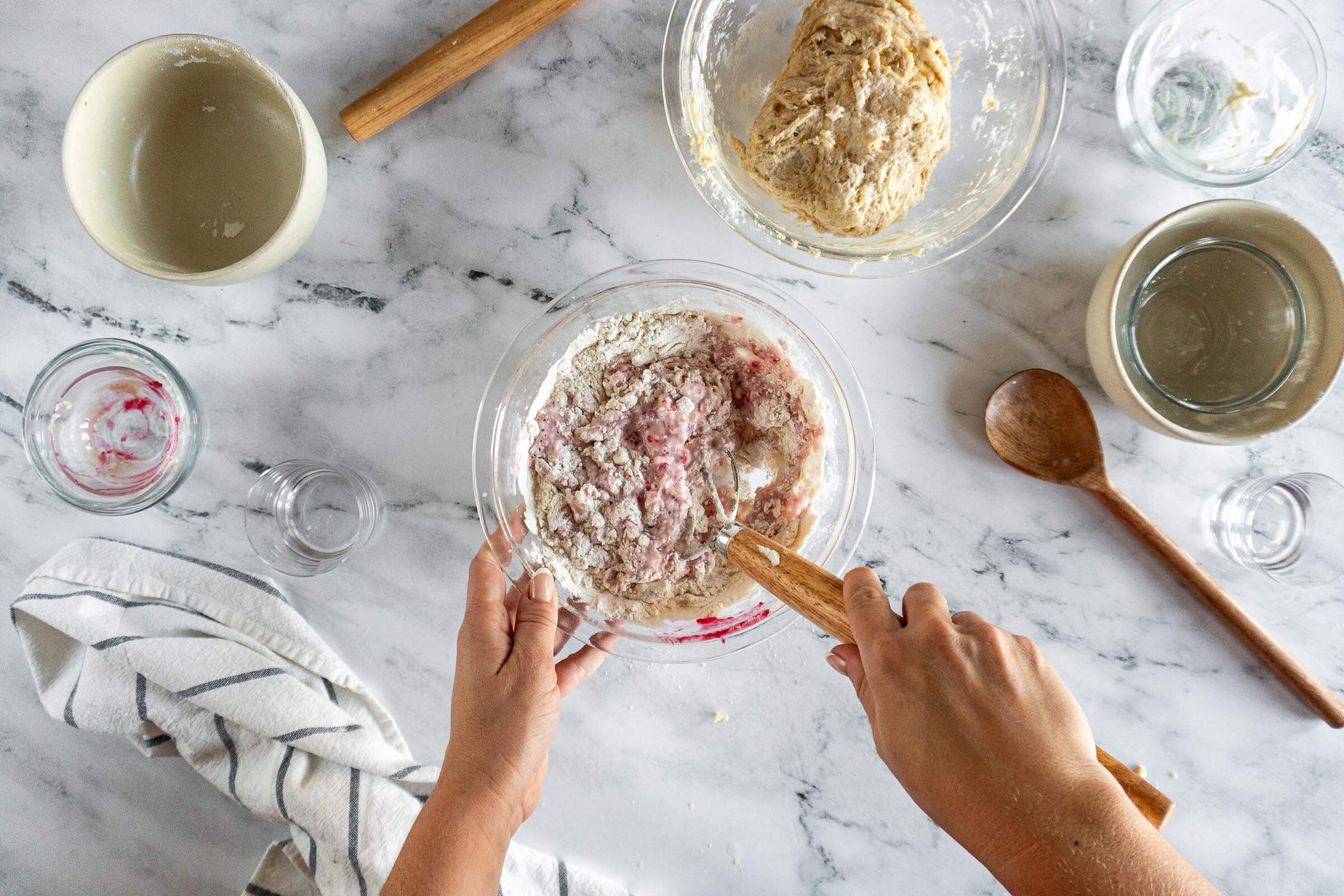 Stirring flour into jam starter mixture. 