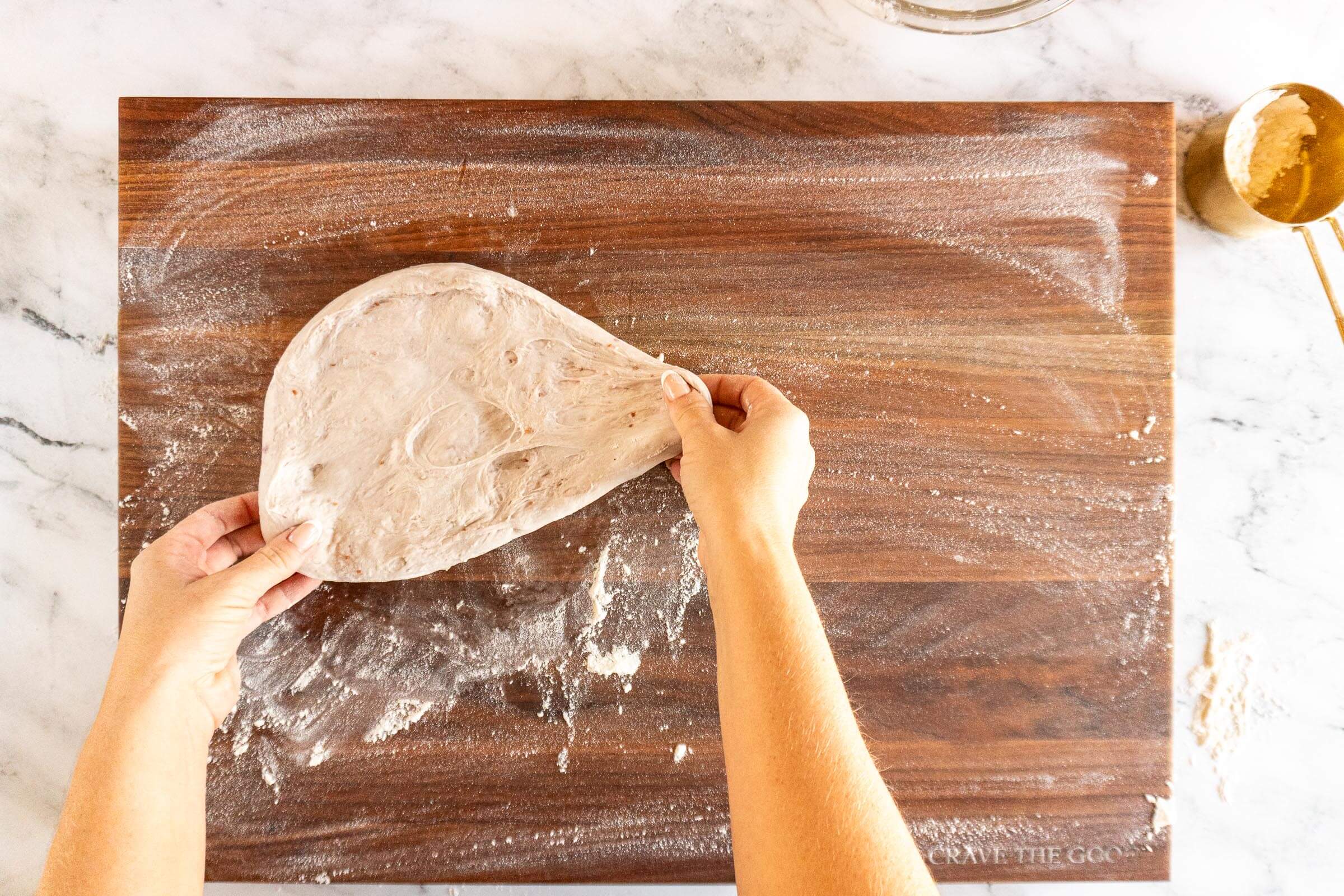 Pressing the jam dough out into a rectangle. 