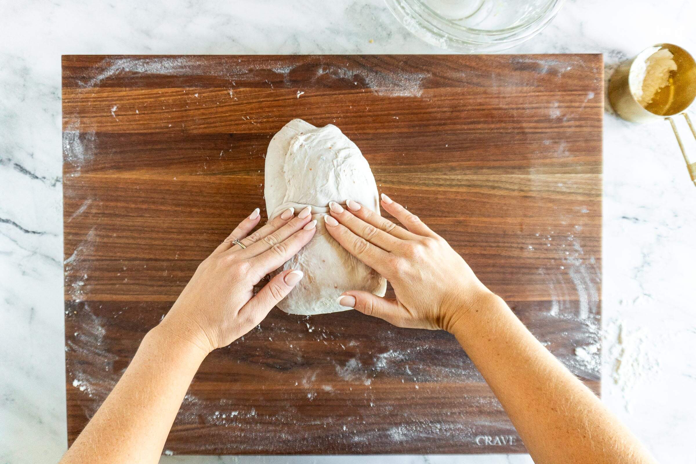 Folding the dough log into thirds. 