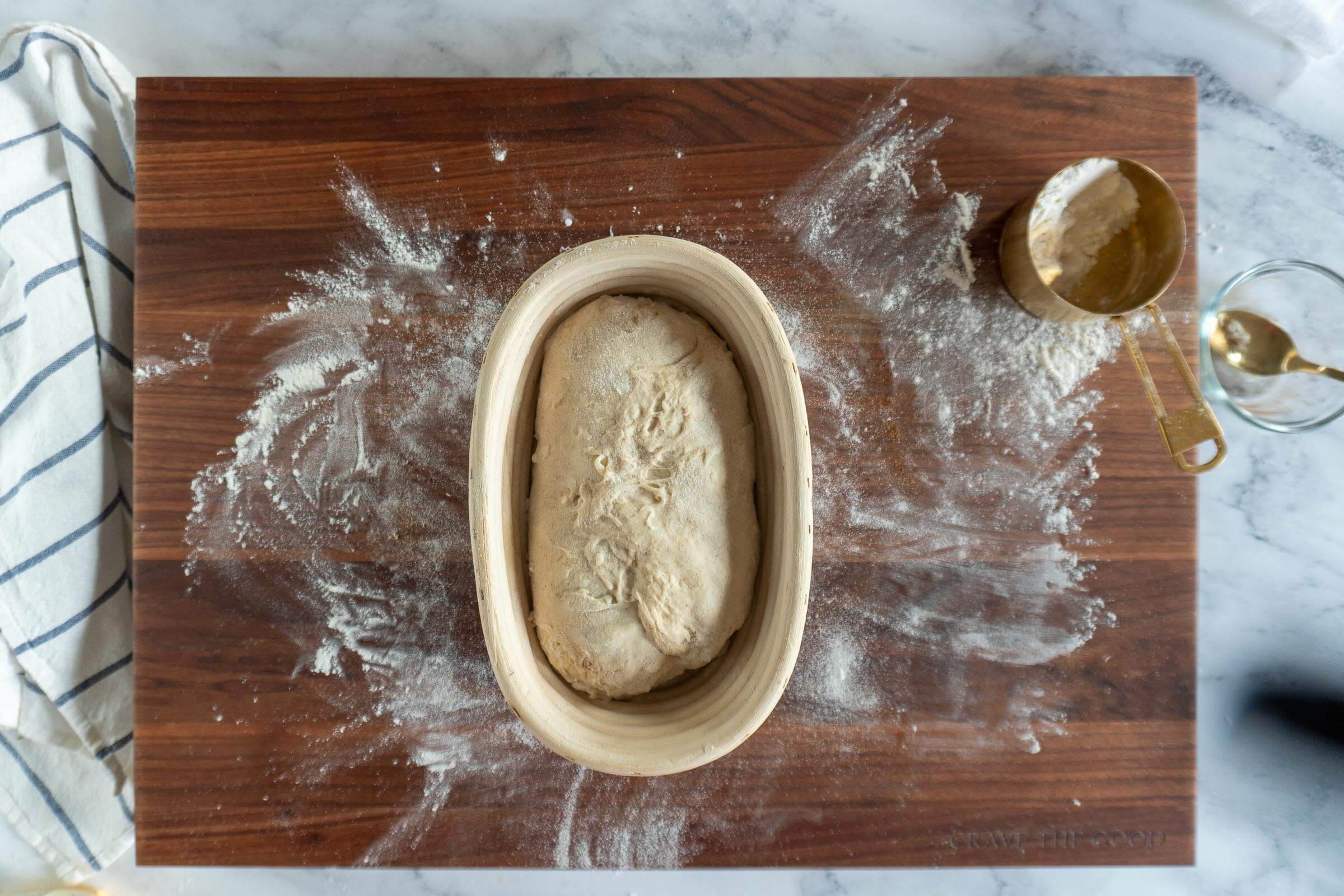 Shaped sourdough loaf in banneton before proving. 