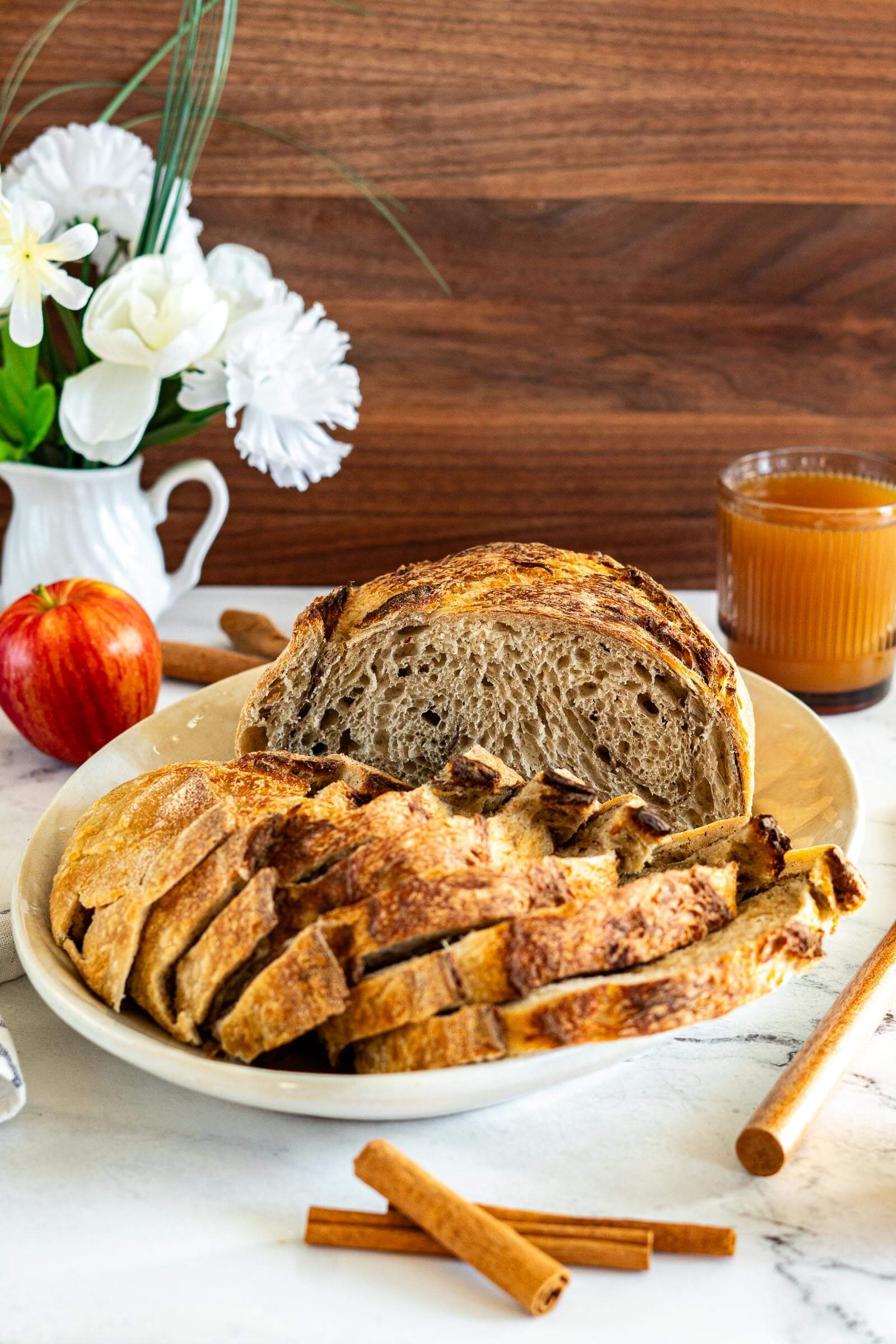 Sliced apple sourdough bread showing the cinnamon swirl.