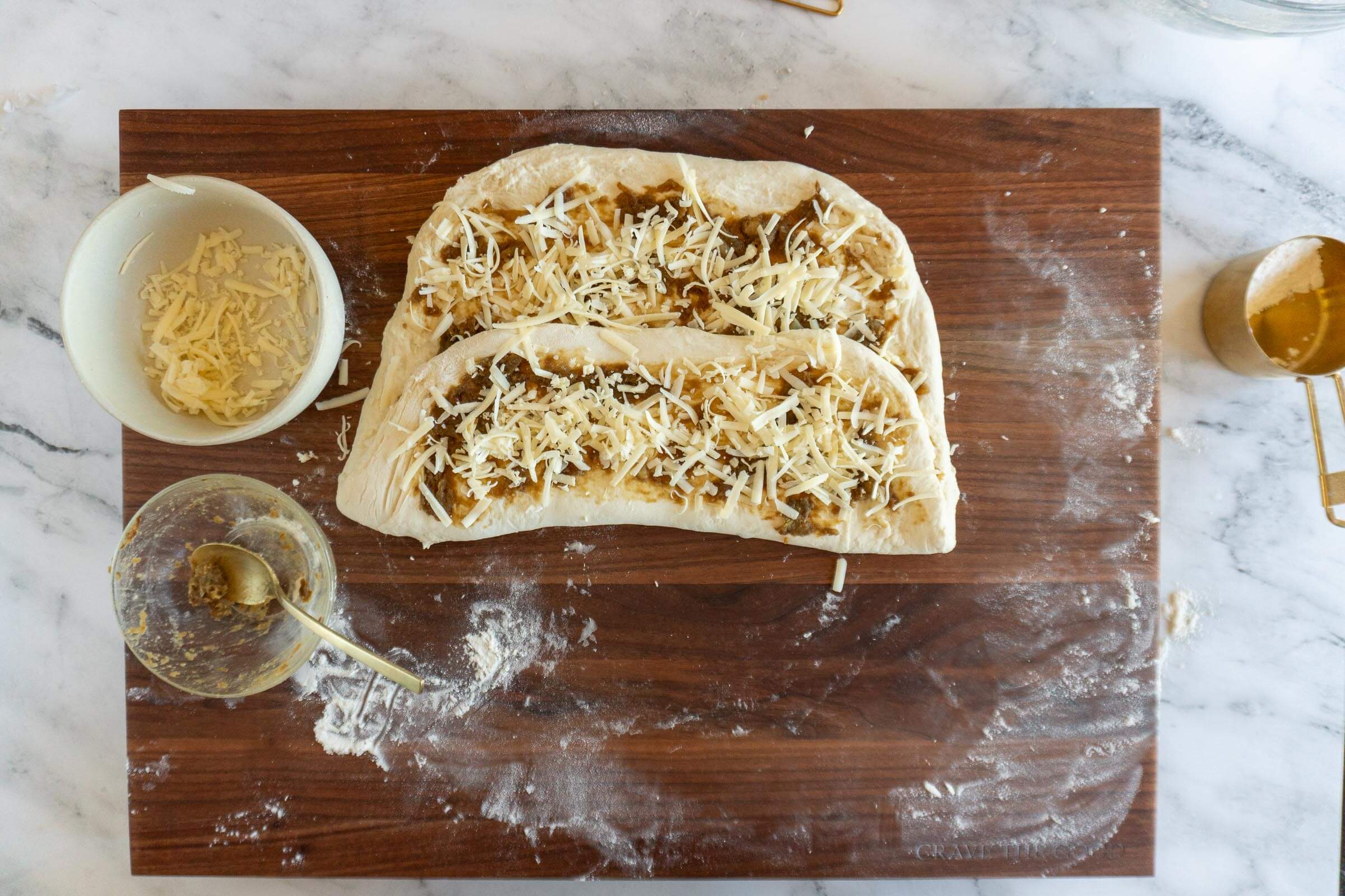 Folding up bottom third of dough. 