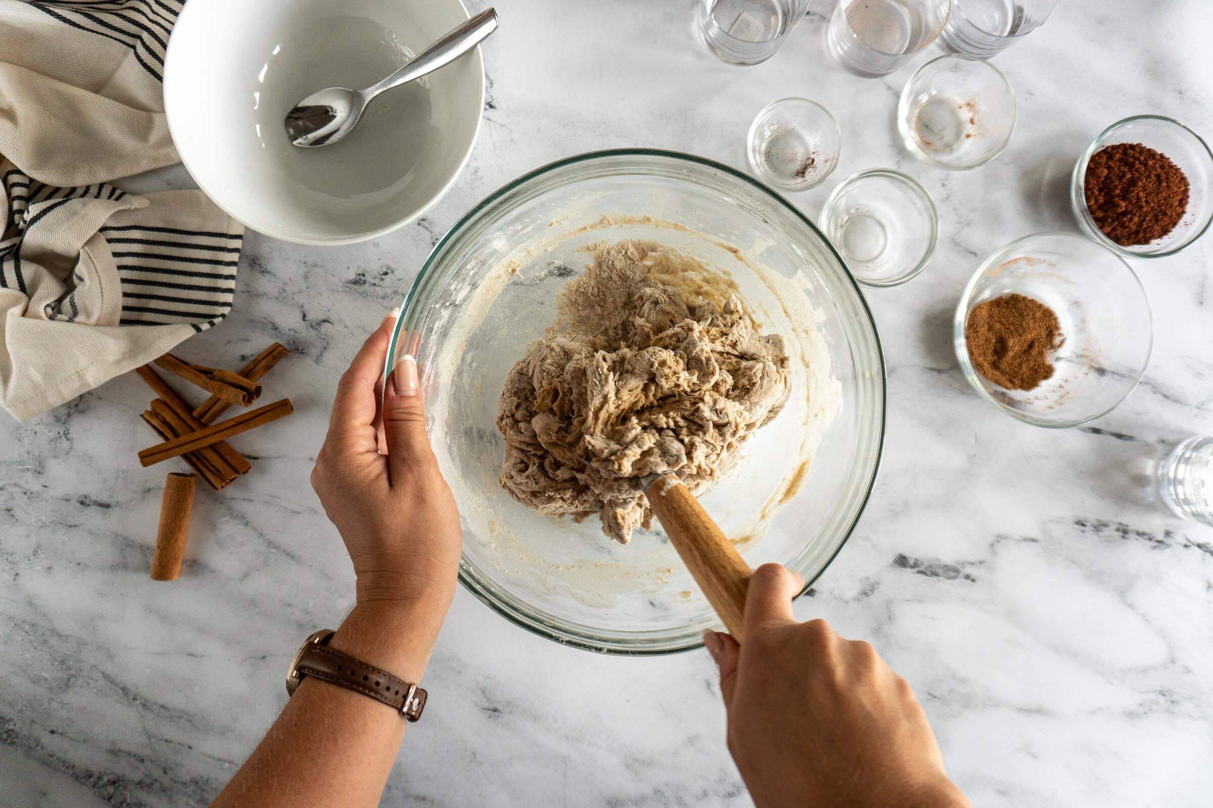 Stirring dough with danish dough whisk.