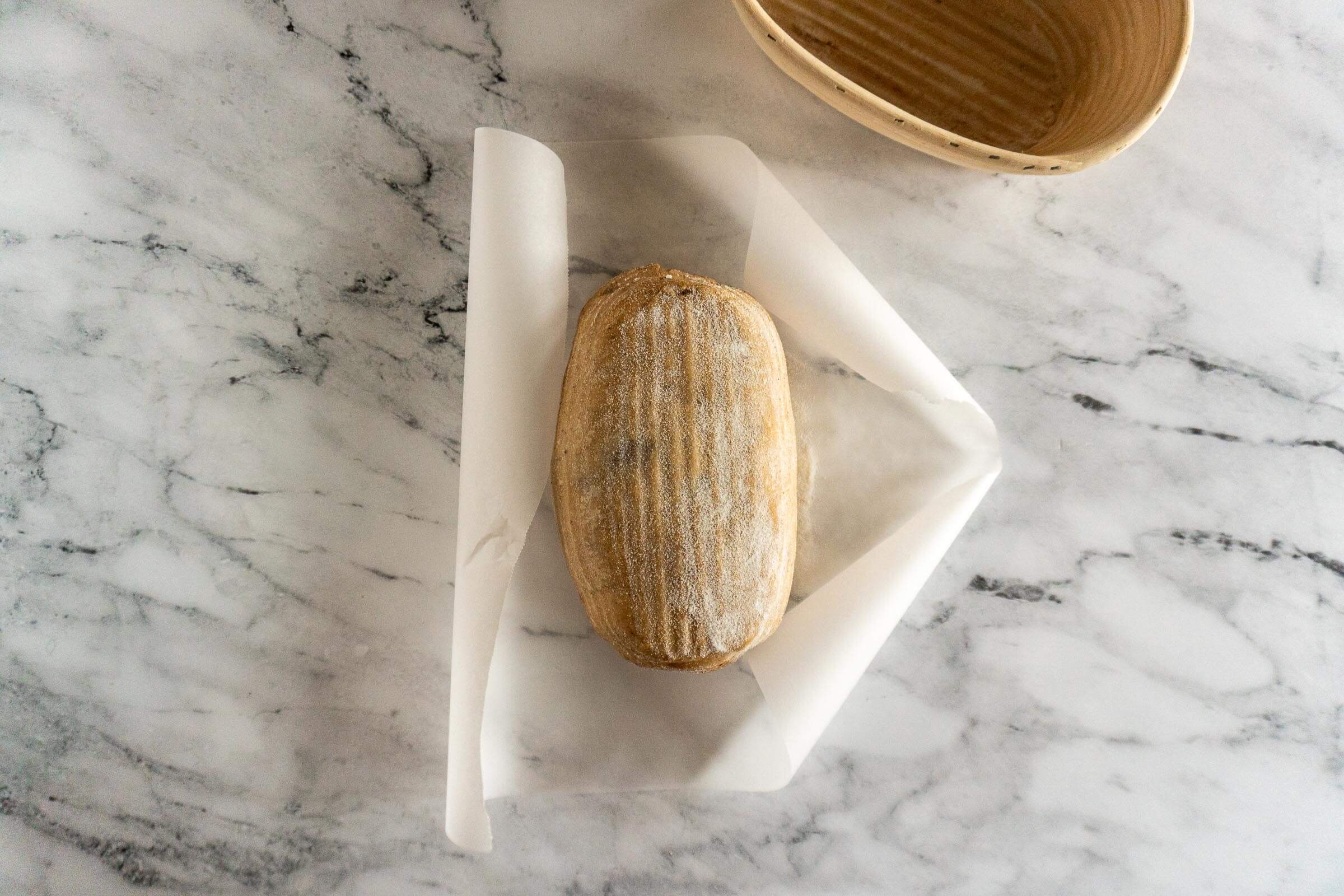 Chai Sourdough turned onto parchment paper. 