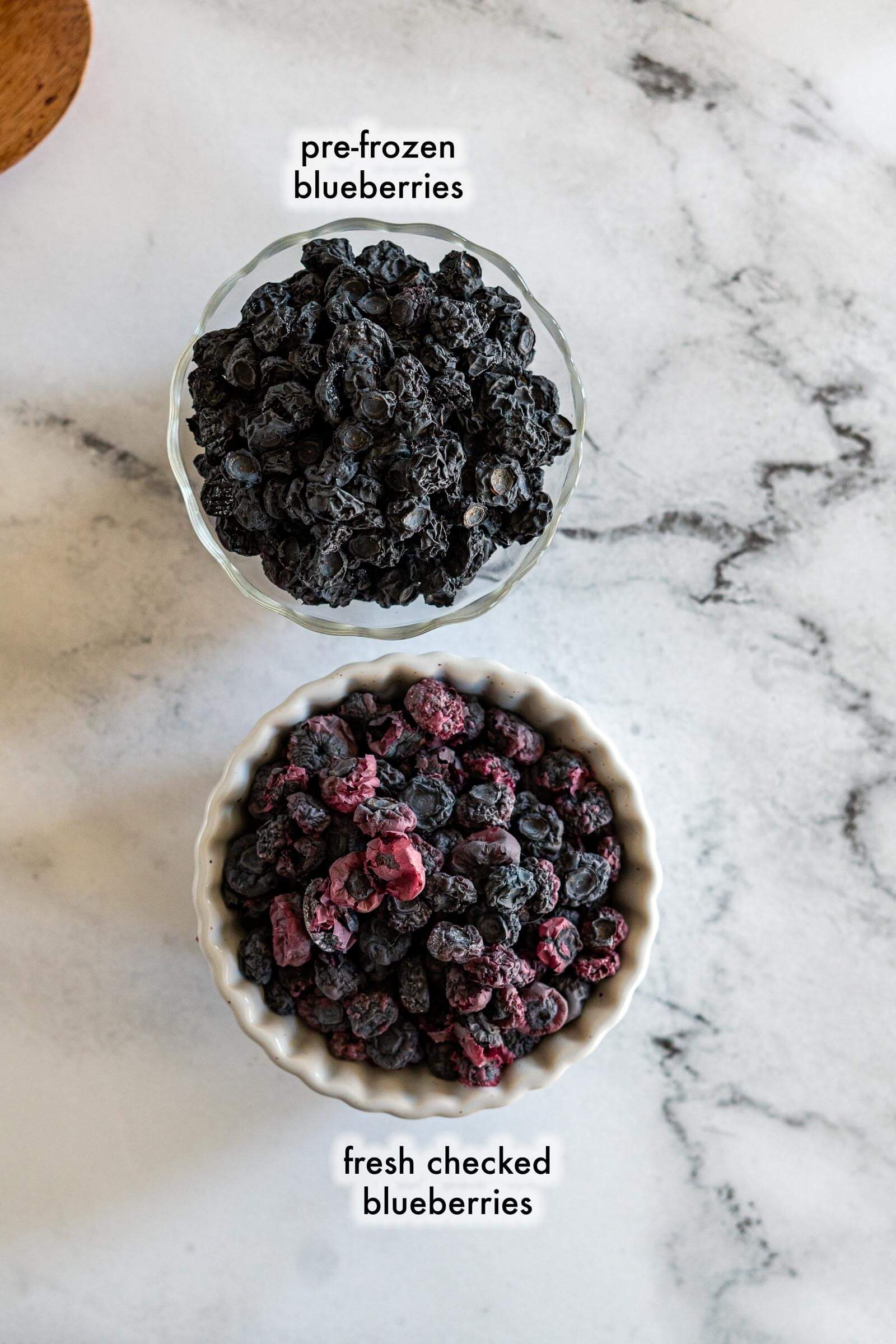 A bowl of frozen then dehydrated berries versus a bowl of checked and dehydrated berries. 