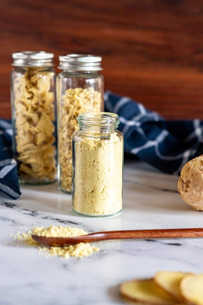 Dried ginger in glass jars.