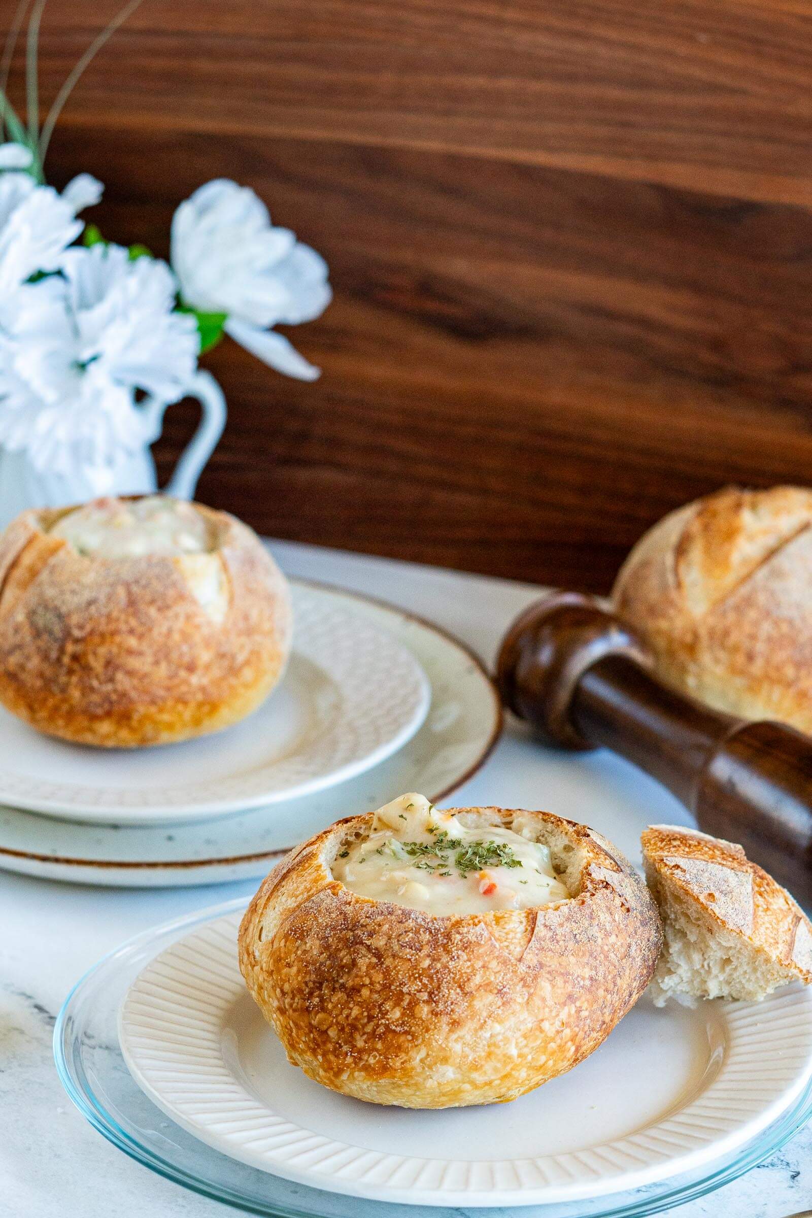 Sourdough bread bowls filled with chowder.