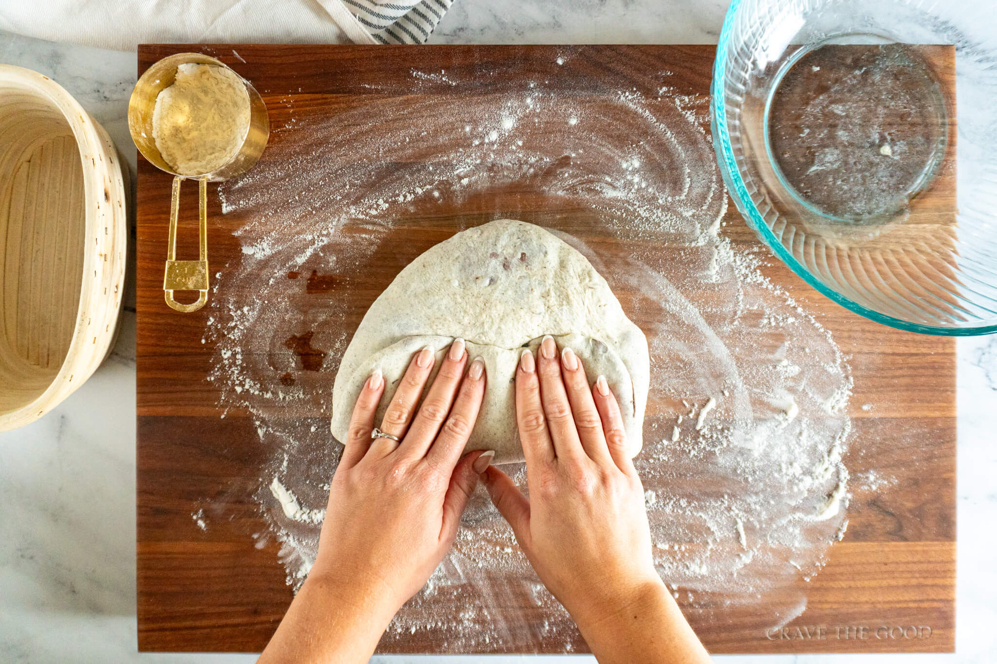 Pressed dough into a rectangle and folding up the bottom. 