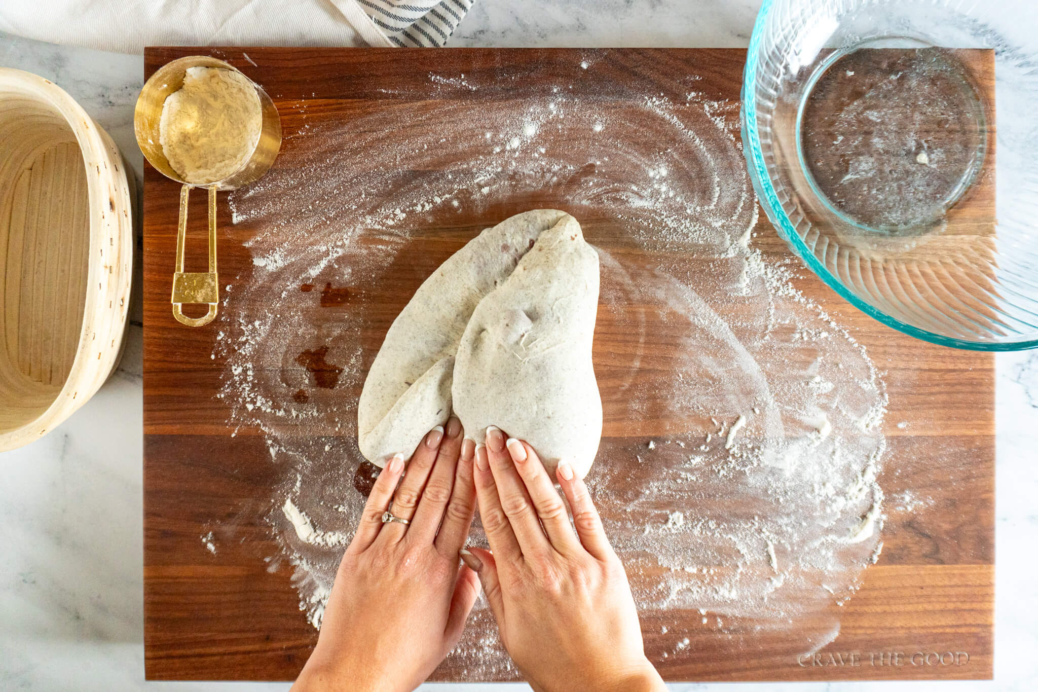 Folding in the corner of the dough. 