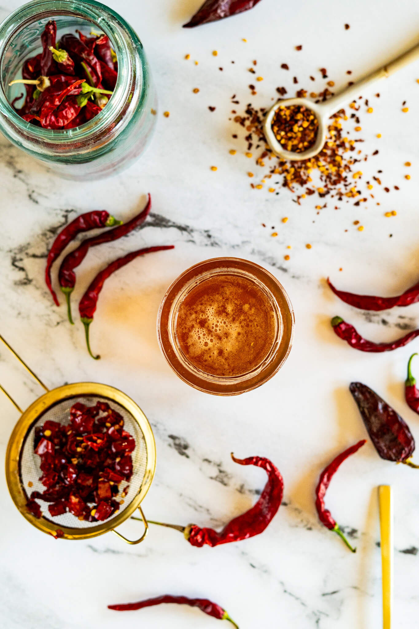 Hot honey with dried peppers and pepper flakes. 